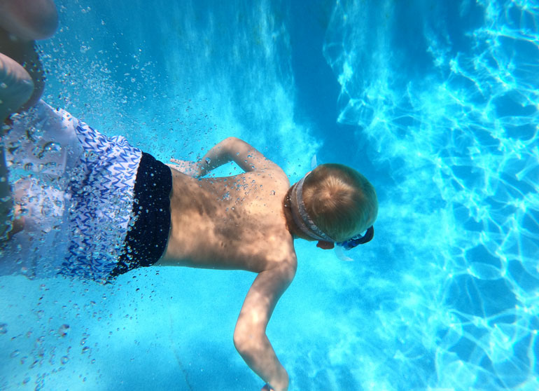 Child swimming underwater